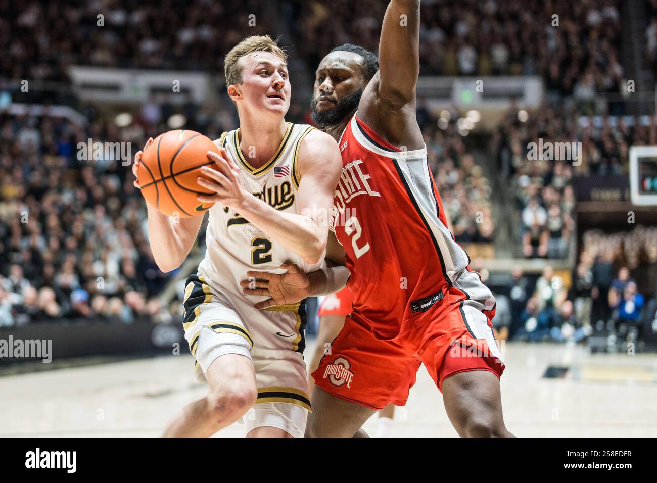 West Lafayette, Indiana, USA. 21st Jan, 2025. Purdue guard FLETCHER LOYER (2) drives to the basket during the NCAA menÃs basketball game between the Ohio Stat Buckeyes and the Purdue Boilermakers, Tuesday January 21, 2025, at Mackey Arena in West Lafayette, Ind. (Credit Image: © David Wegiel/ZUMA Press Wire) EDITORIAL USAGE ONLY! Not for Commercial USAGE! Stock Photo