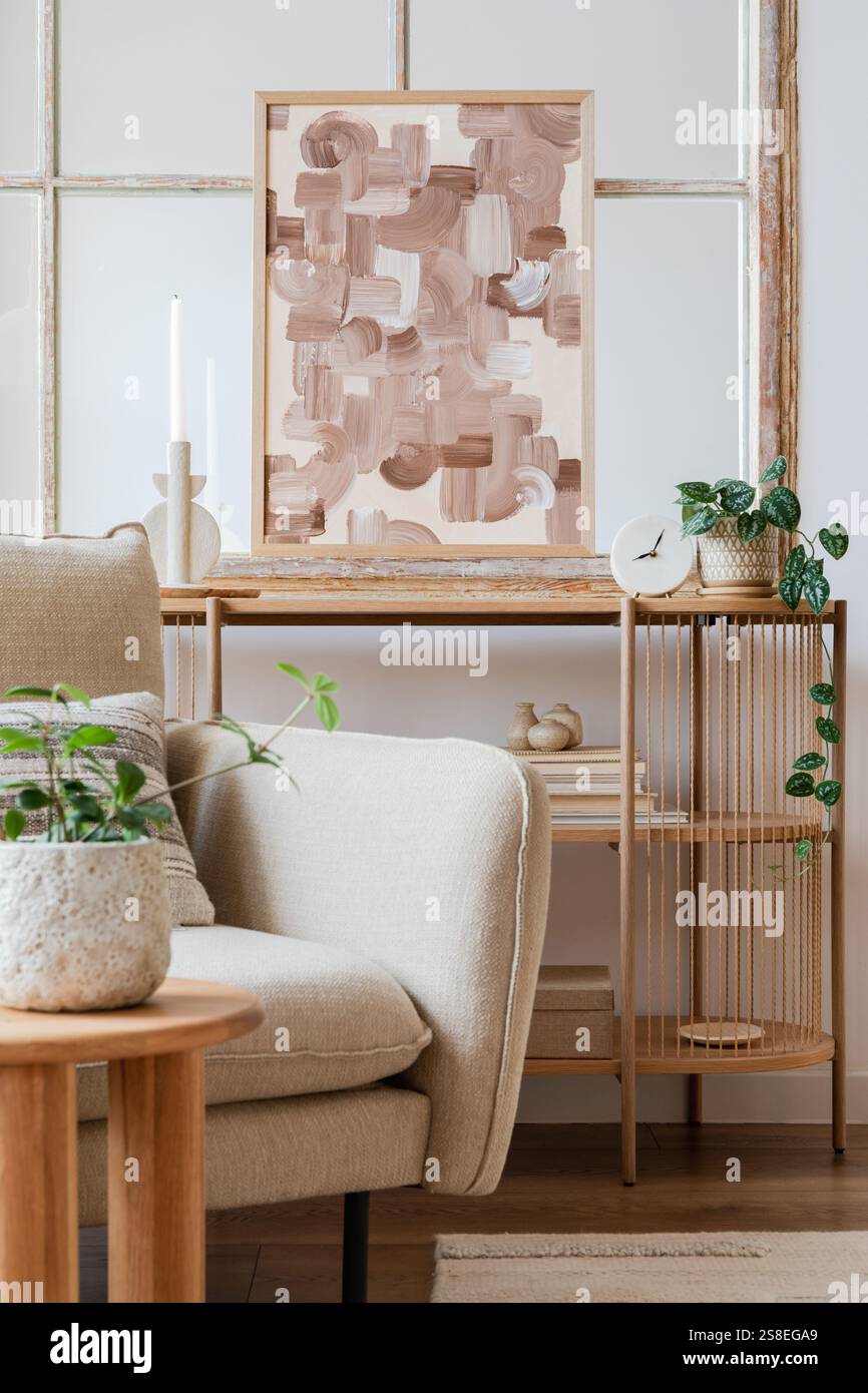 Stylish composition of living room interior with mock up frame. Creative modern furniture and home accessories. Home staging. Template. Copy space. Stock Photo