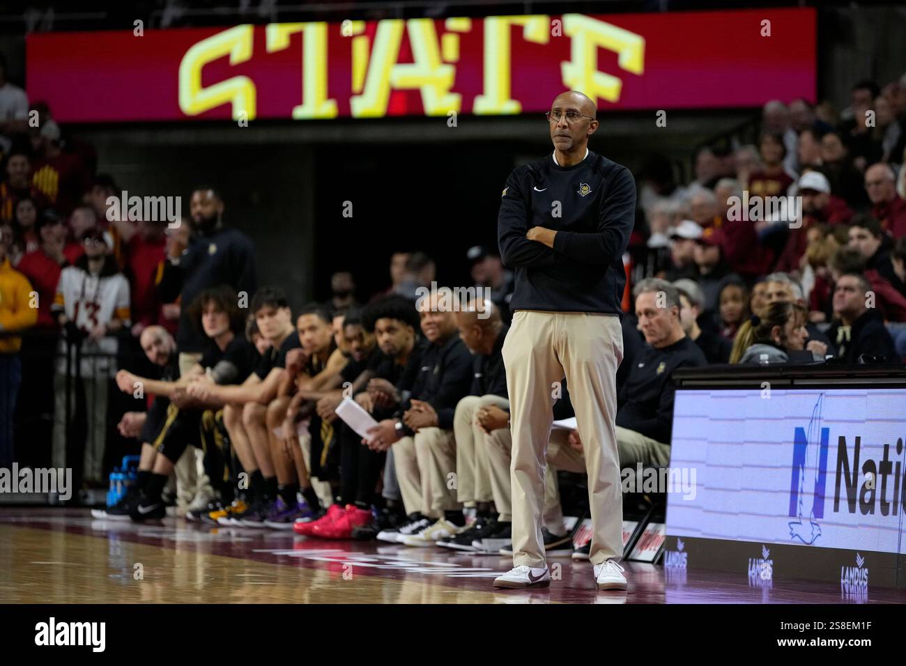 UCF head coach Johnny Dawkins watches from the bench during the first
