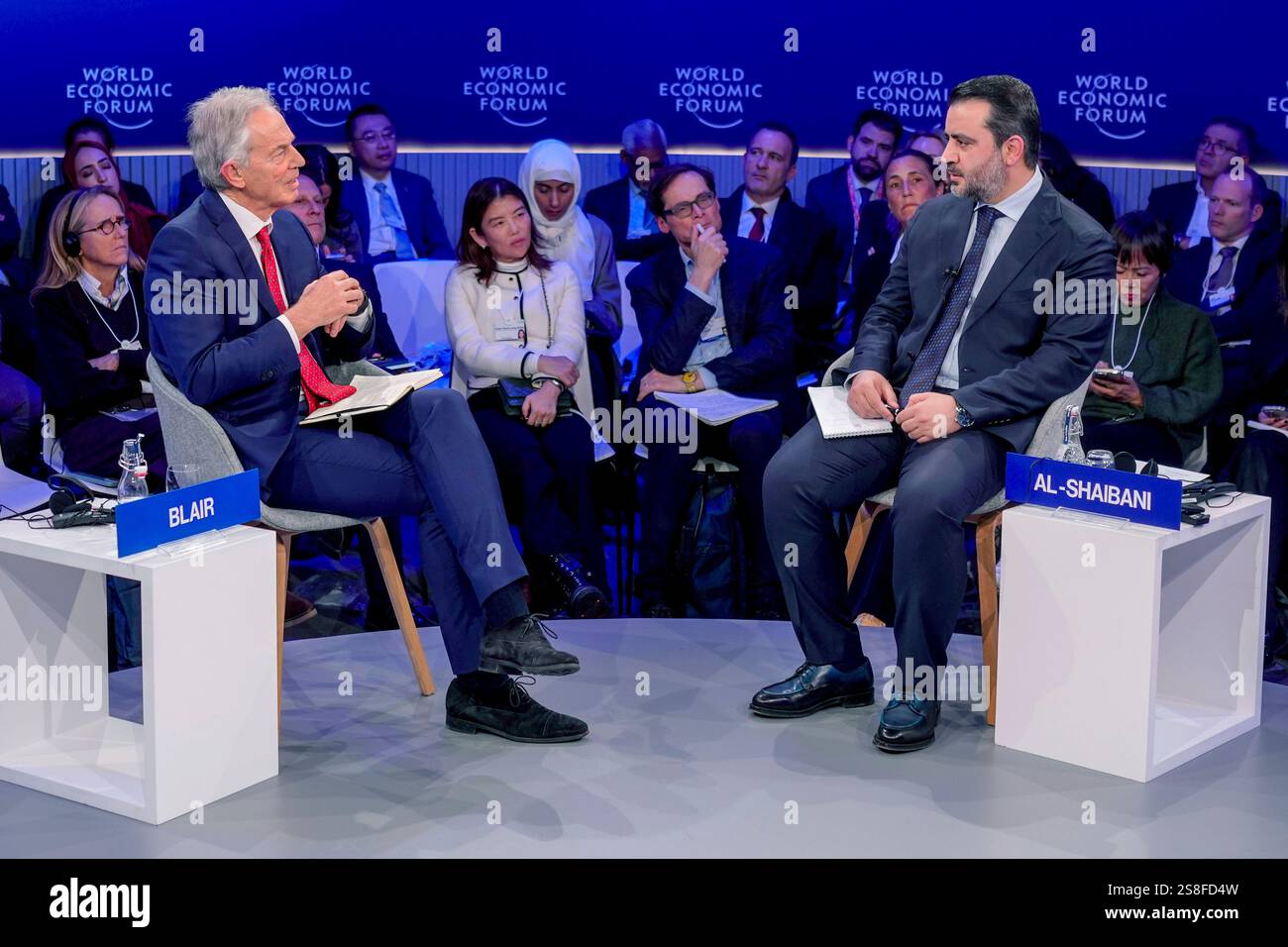 Former UK Prime Minister Tony Blair, left, and Syrian Minister of