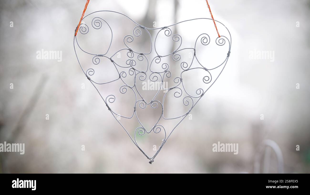 Hearts formed of metal on a white background. Stock Photo