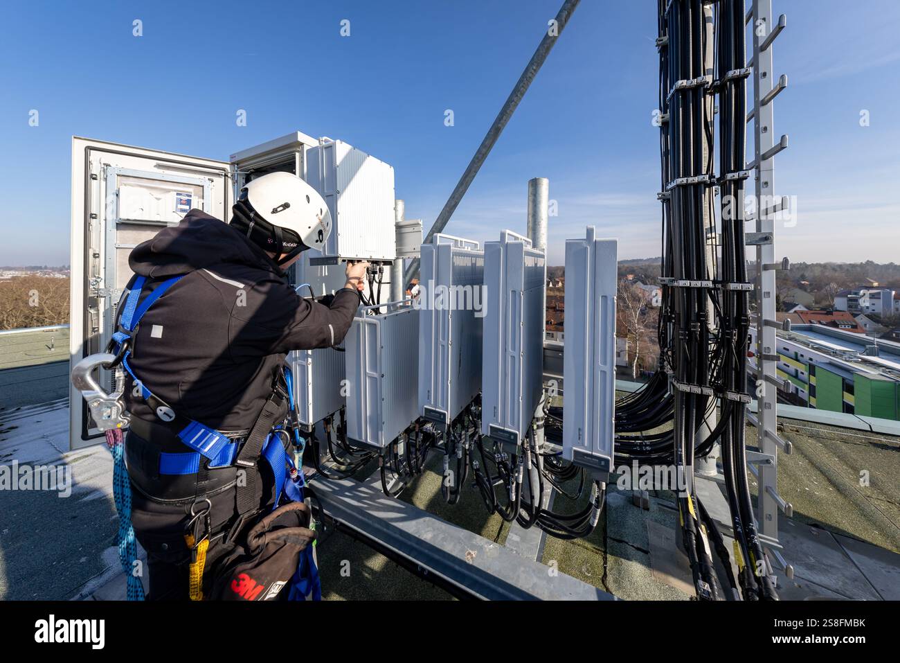 21 January 2025, Bavaria, Nuremberg A Deutsche Telekom technician