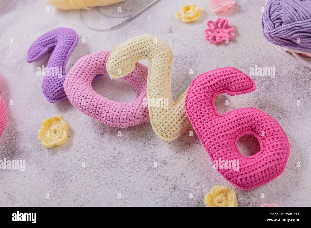 New Years background with multicolored crochet numbers 2026 Stock Photo