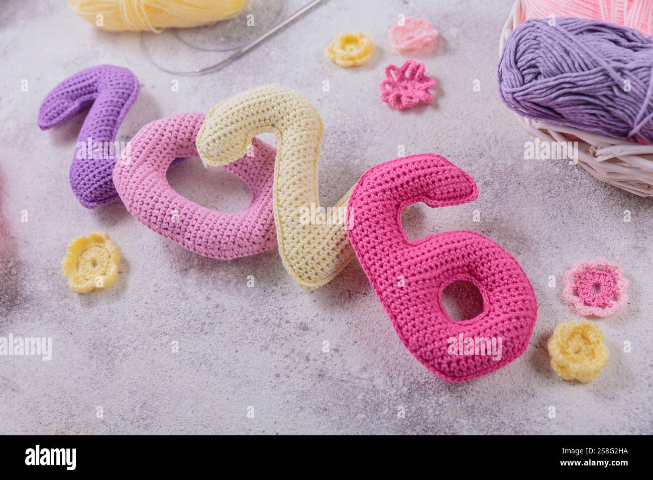 New Years background with multicolored crochet numbers 2026 Stock Photo