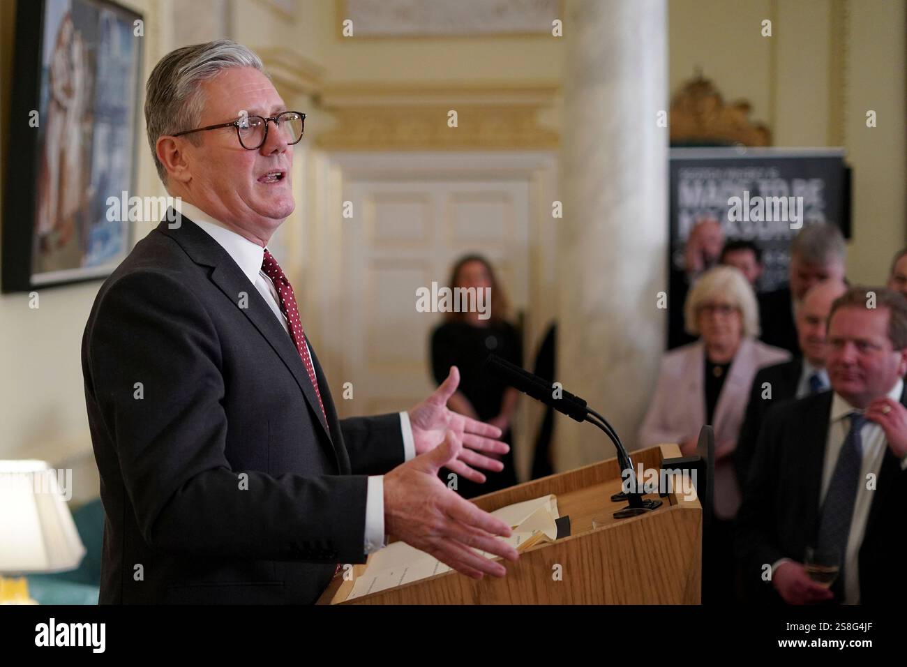 Britain's Prime Minister Keir Starmer speaks to guests as he hosts a