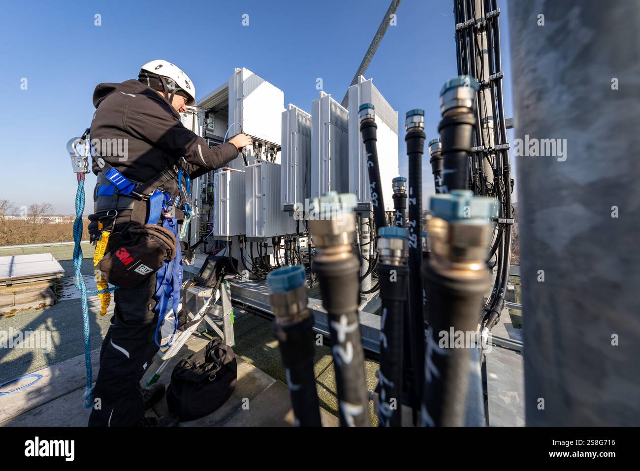 21 January 2025, Bavaria, Nuremberg A Deutsche Telekom technician