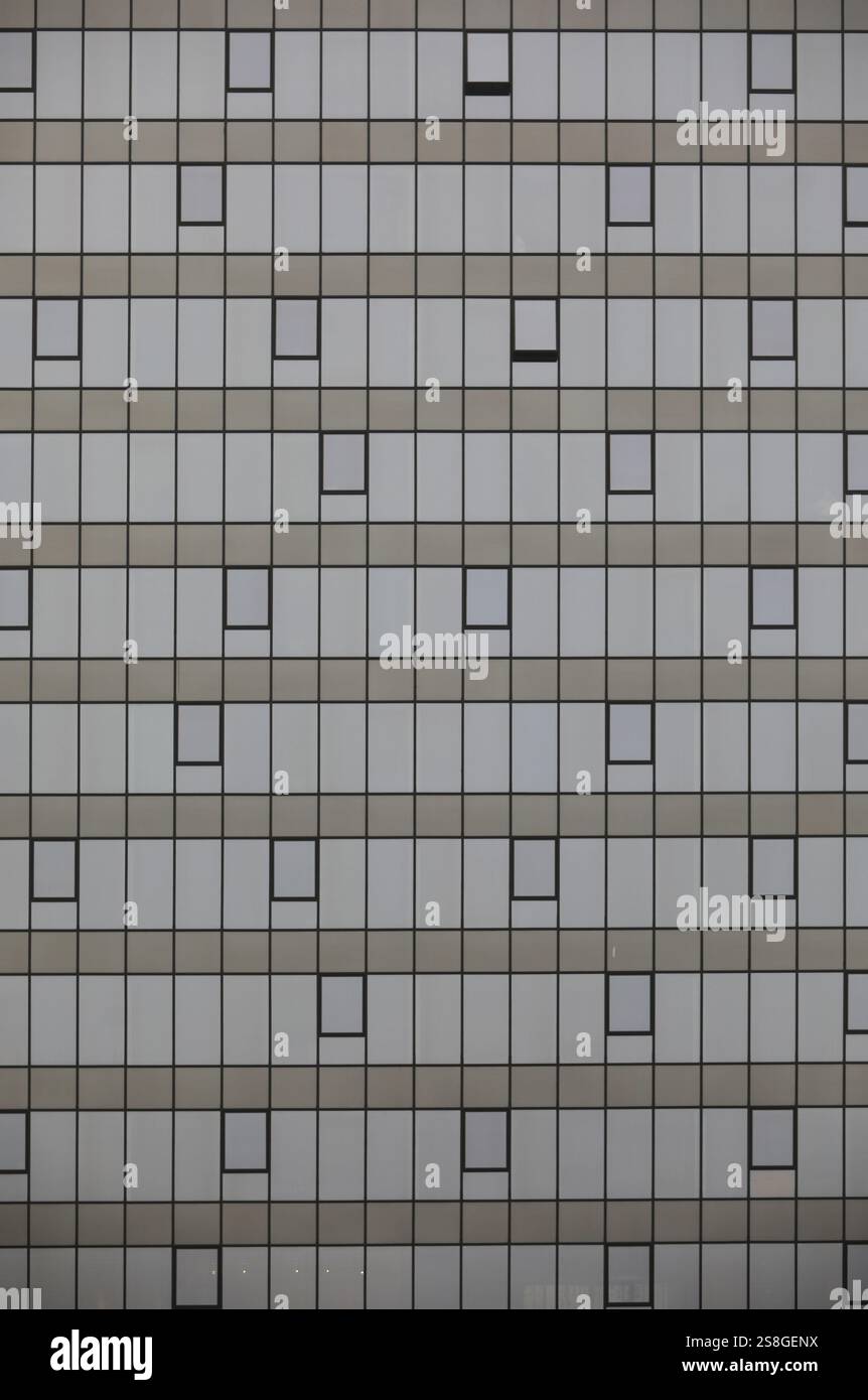 Sky reflecting in windows of office building Stock Photo - Alamy