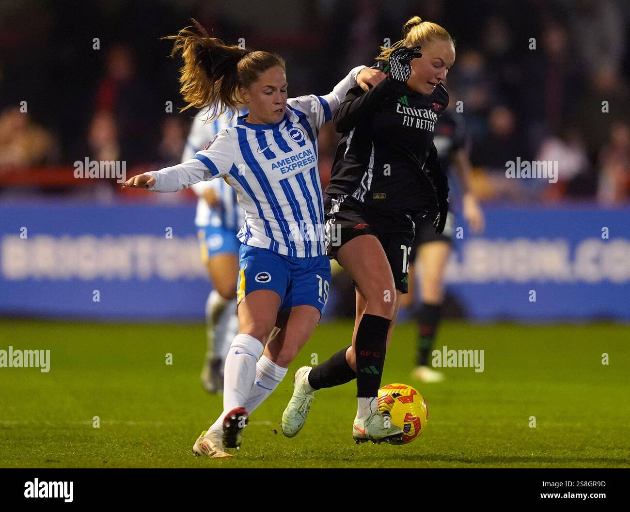 Brighton and Hove Albion's Marisa Olislagers (left) and Arsenal's Frida