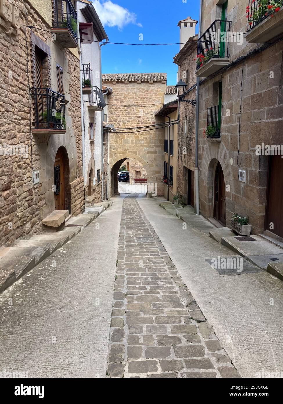 El Portal: The Medieval Hilltop Village of Cirauqui, Zirauki with Narrow Winding Streets and Houses with Balconies. Navarre, Spain - Smartphone Captured Stock Image
