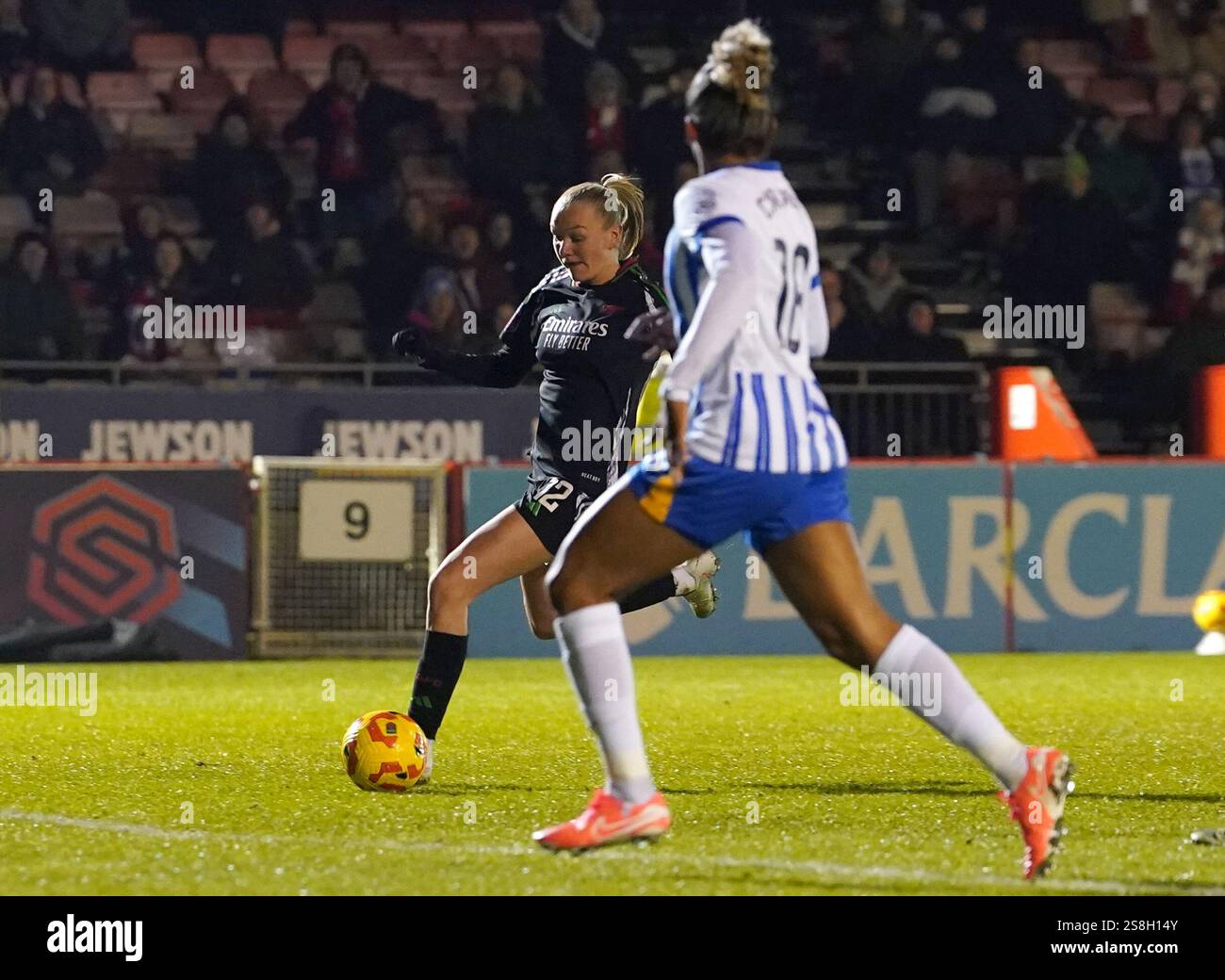 Arsenal's Frida Maanum scores their side's first goal of the game