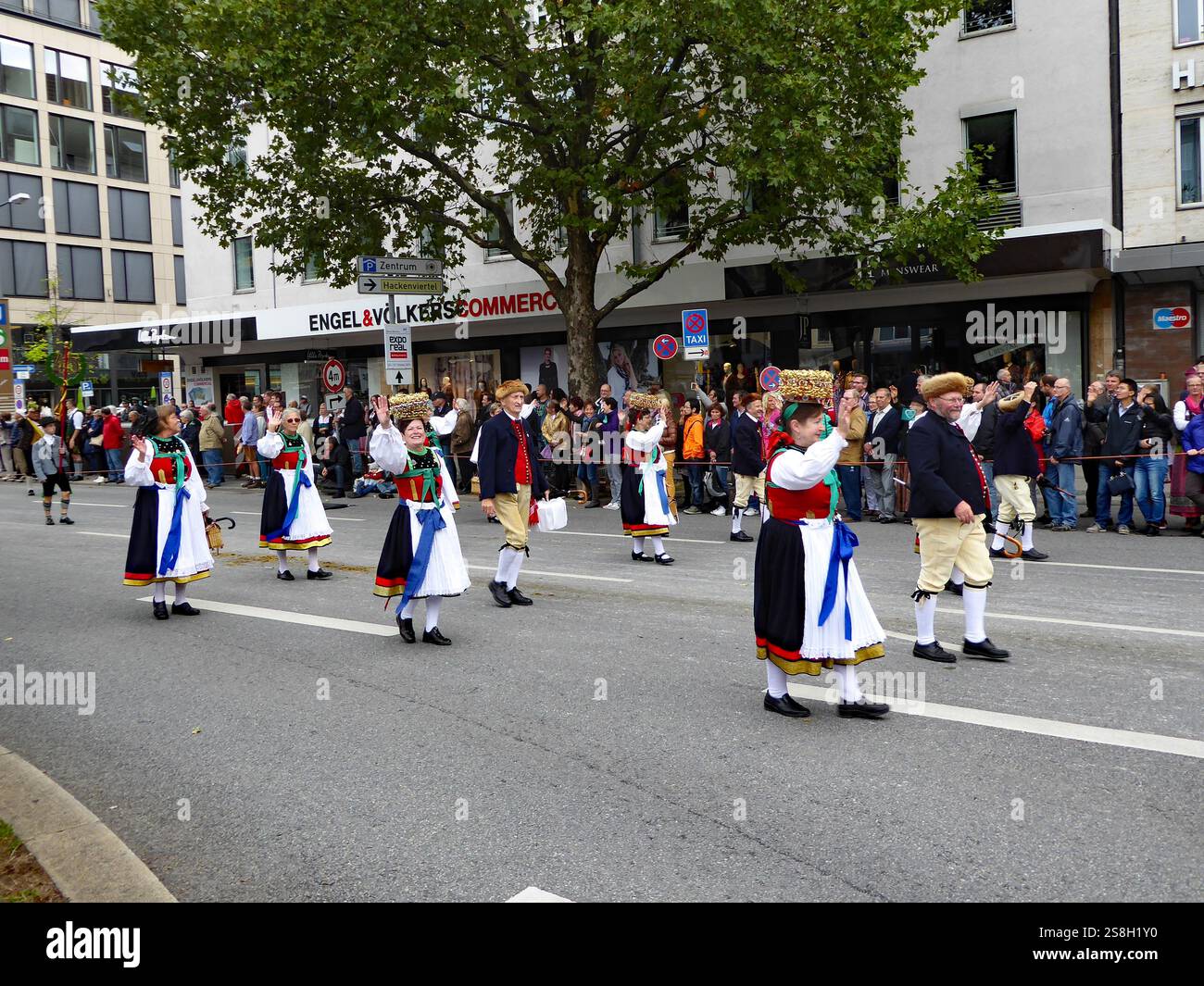 a traditional procession during the Bavarian Oktoberfest in Munich with ...