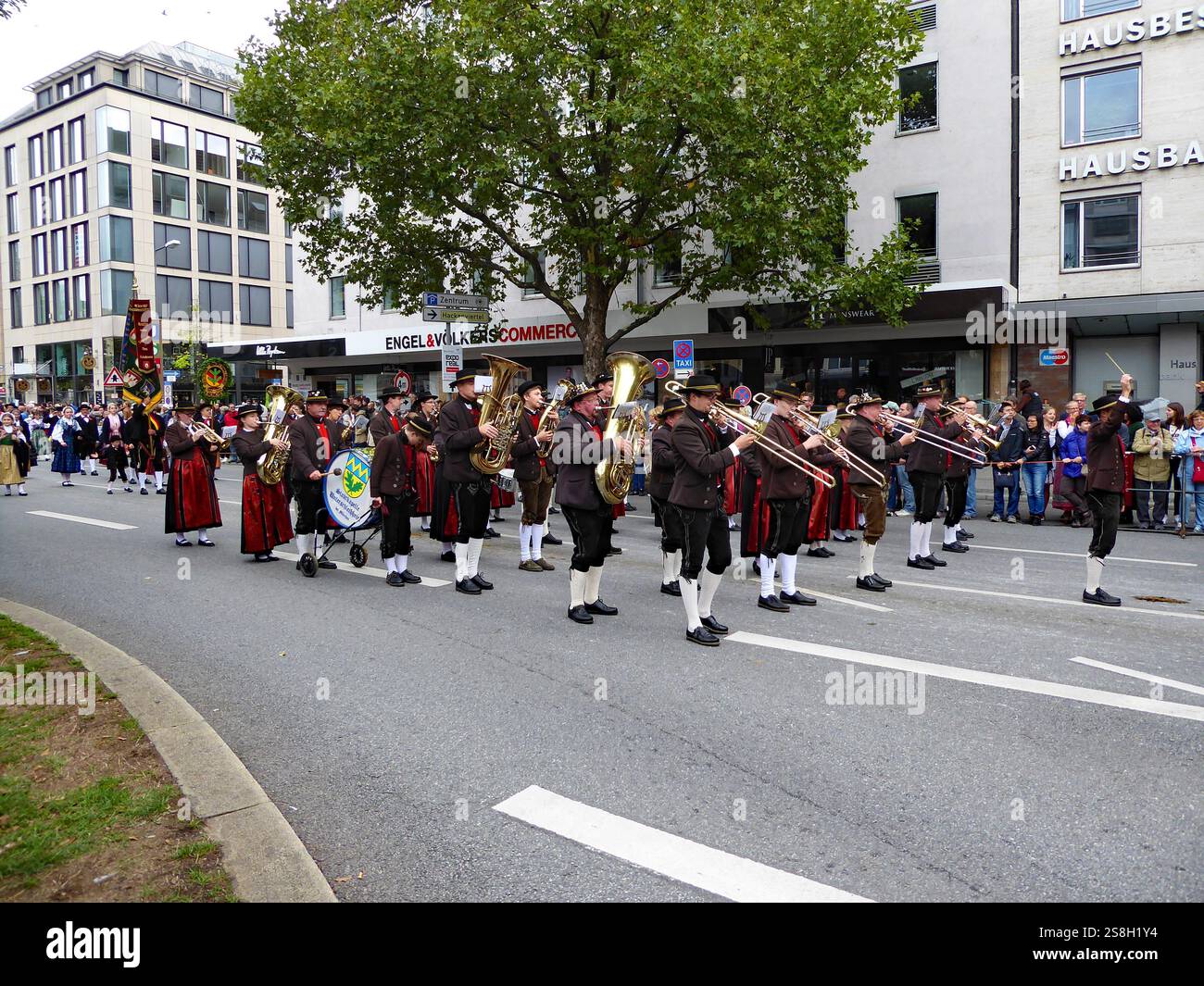 a traditional procession during the Bavarian Oktoberfest in Munich with ...