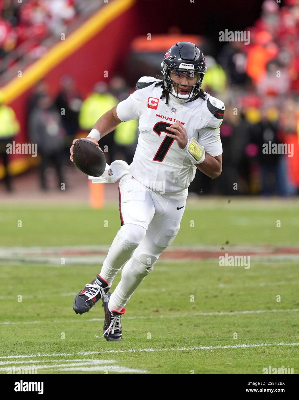 Houston Texans quarterback C.J. Stroud runs the ball during the first