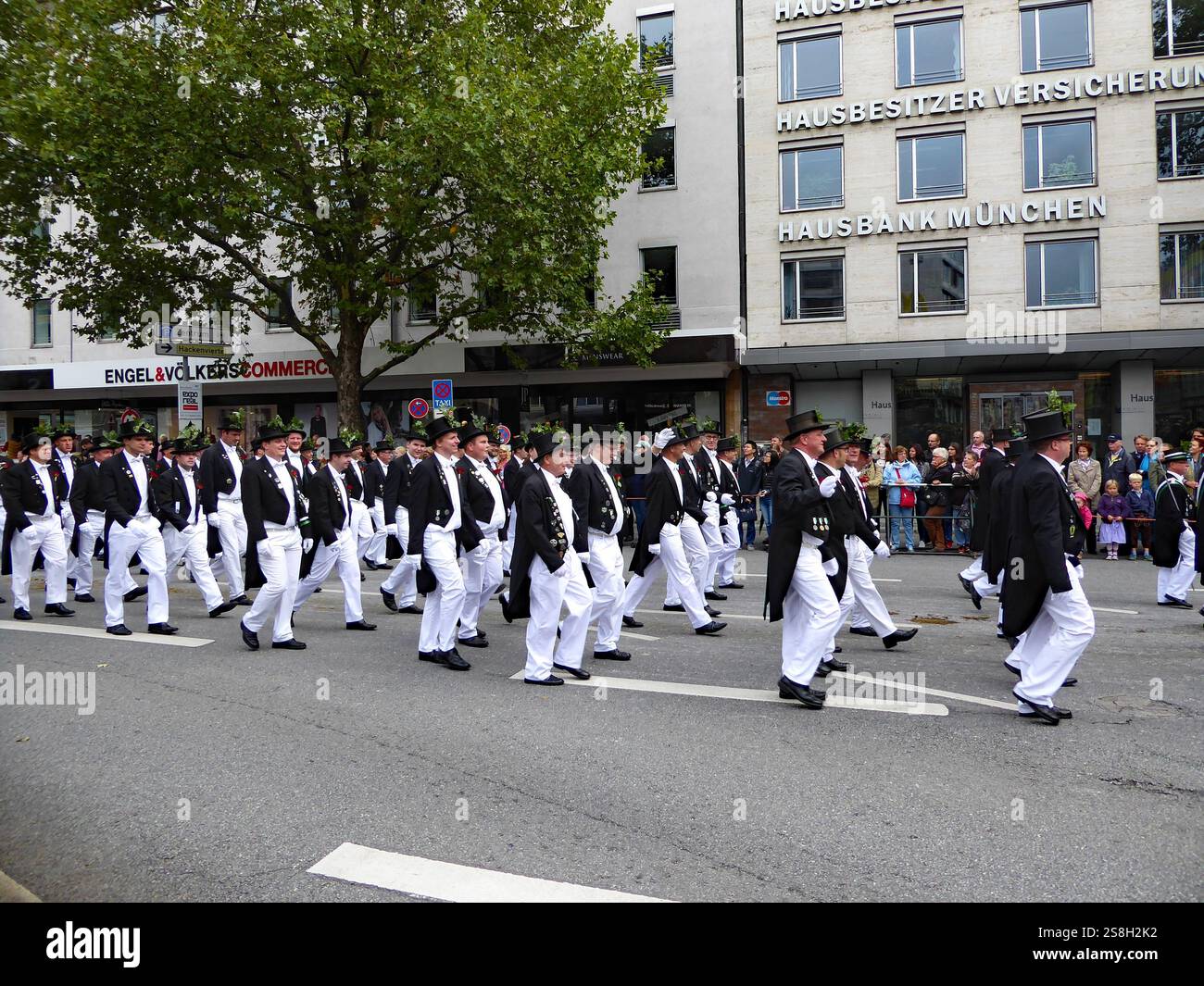 a traditional procession during the Bavarian Oktoberfest in Munich with ...