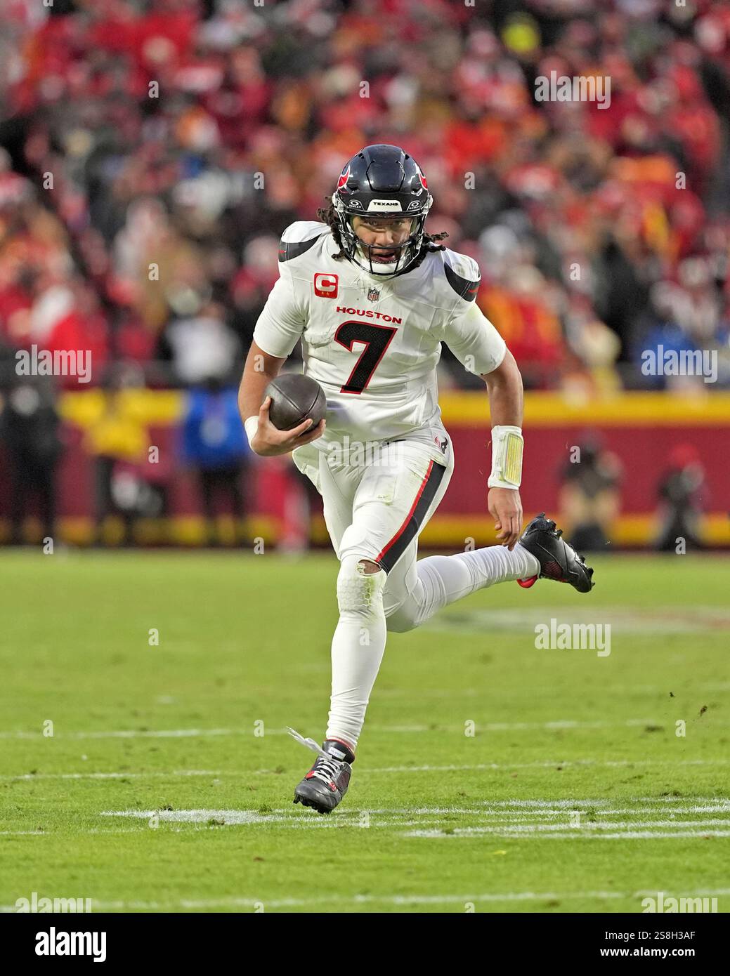 Houston Texans quarterback C.J. Stroud runs the ball during the second