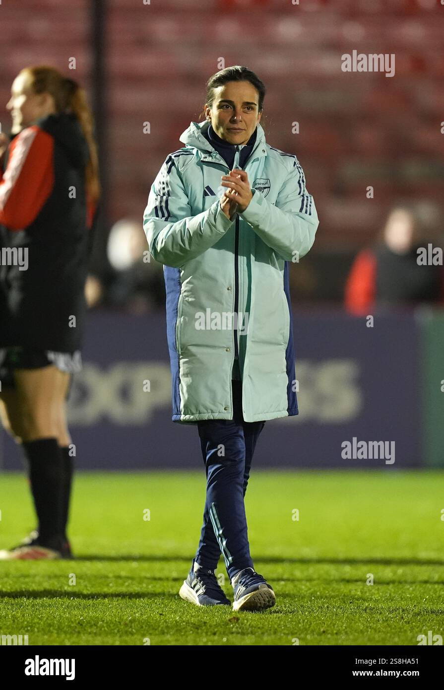 Arsenal interim manager Renee Slegers applauds the fans after the