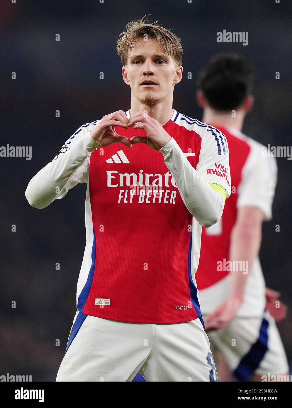 Arsenal's Martin Odegaard celebrates scoring their side's third goal of