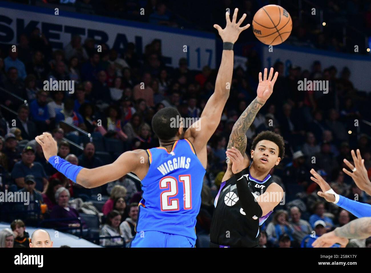 Utah Jazz guard Keyonte George, right, passes over Oklahoma City ...
