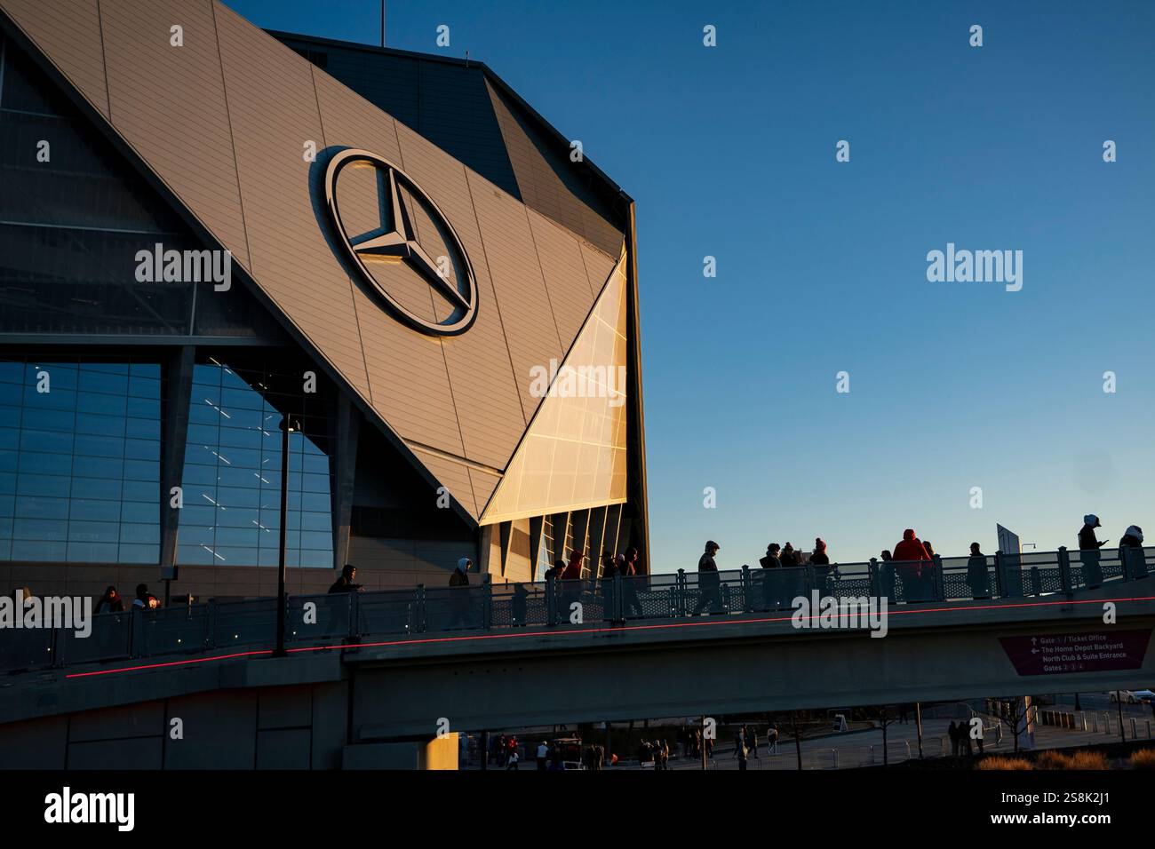 Fans walk into the stadium before the College Football Playoff national