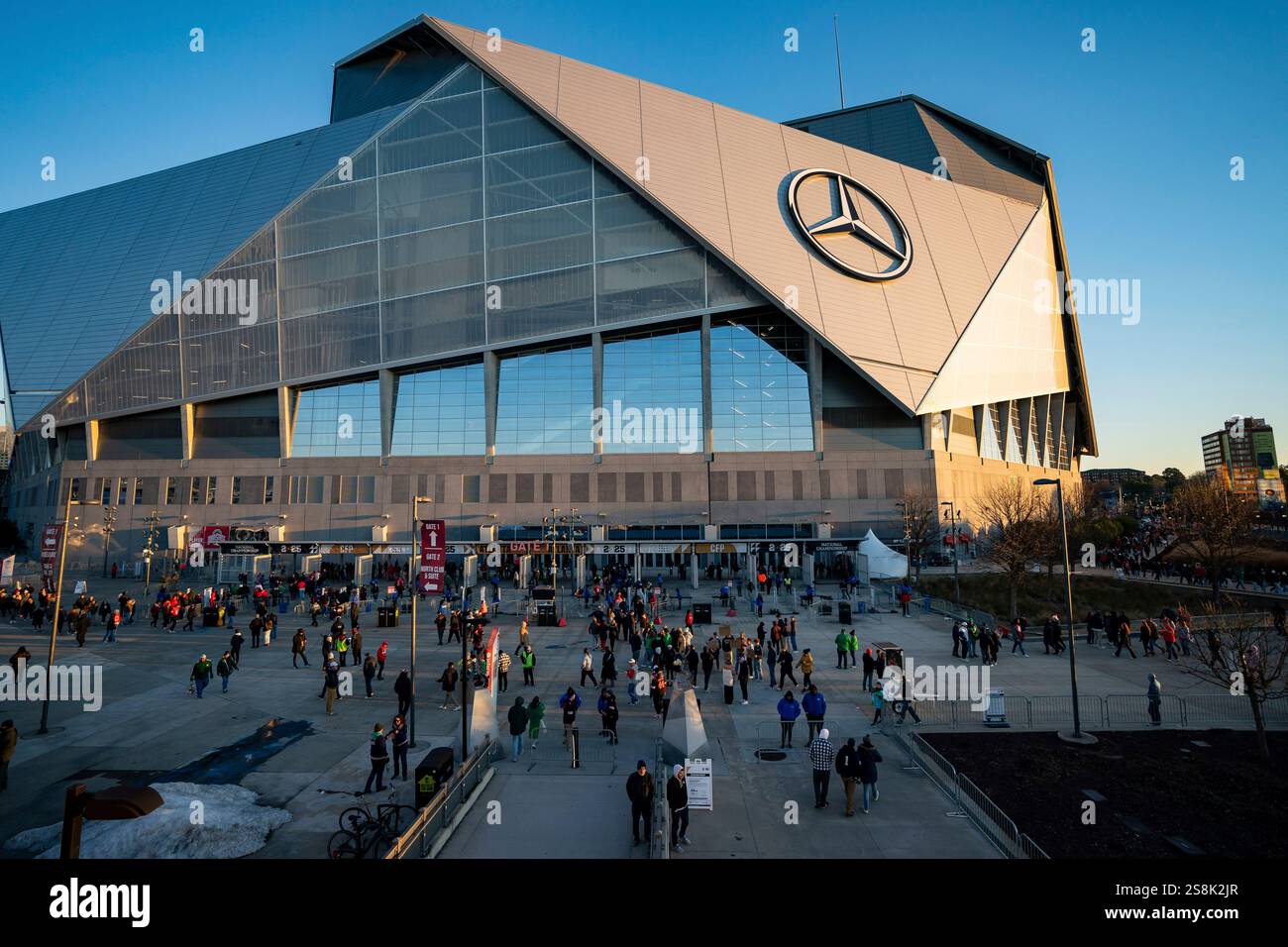 Fans walk into the stadium before the College Football Playoff national