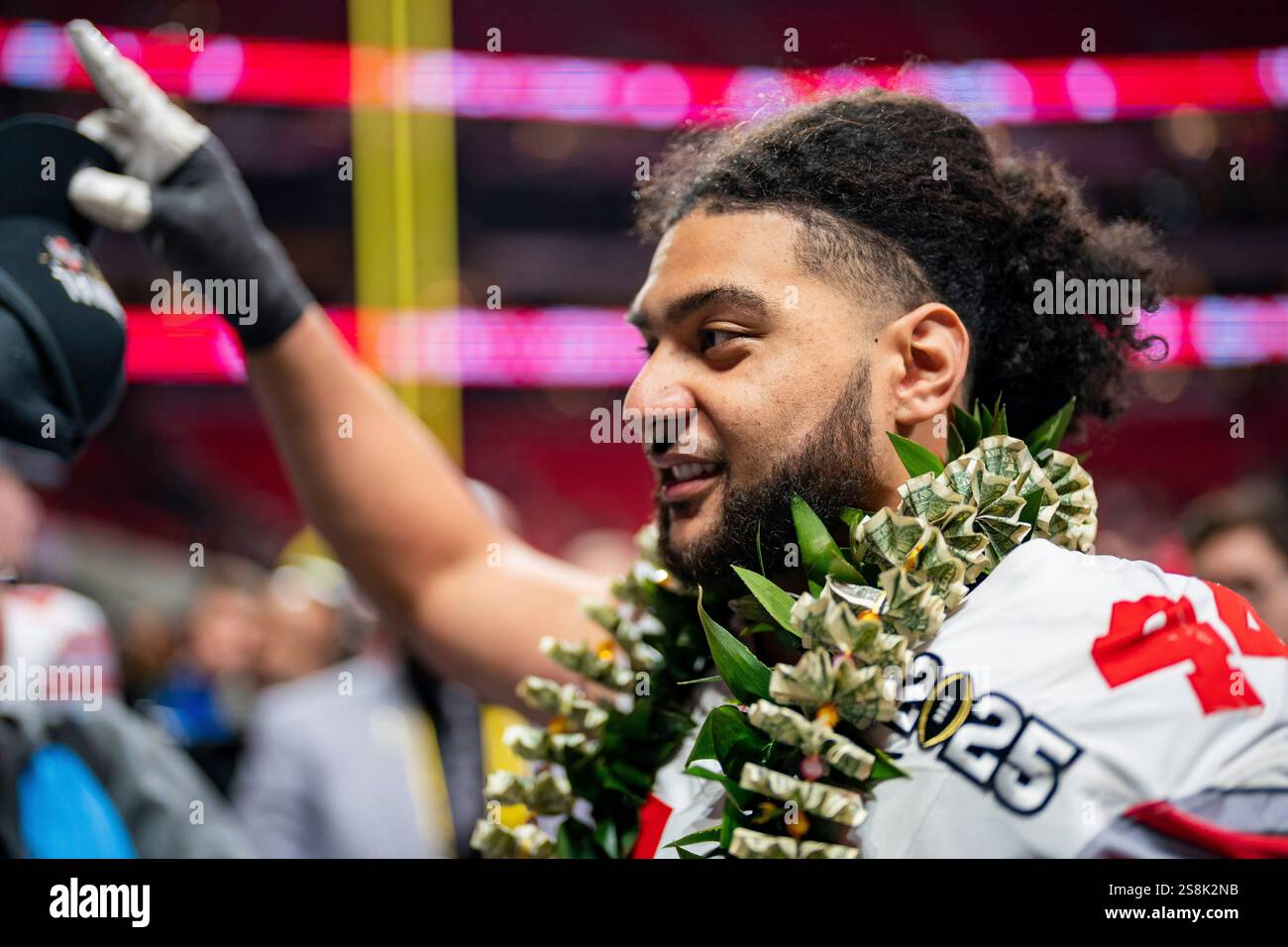 Ohio State defensive end JT Tuimoloau (44) celebrates after defeating
