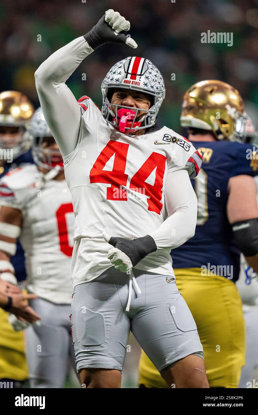 Ohio State defensive end JT Tuimoloau (44) reacts during the College