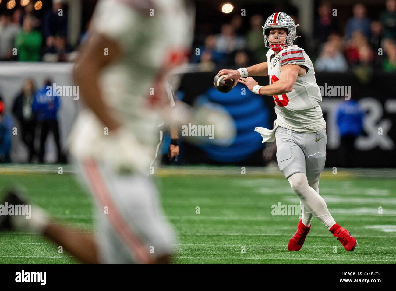 Ohio State quarterback Will Howard (18) passes the ball during the