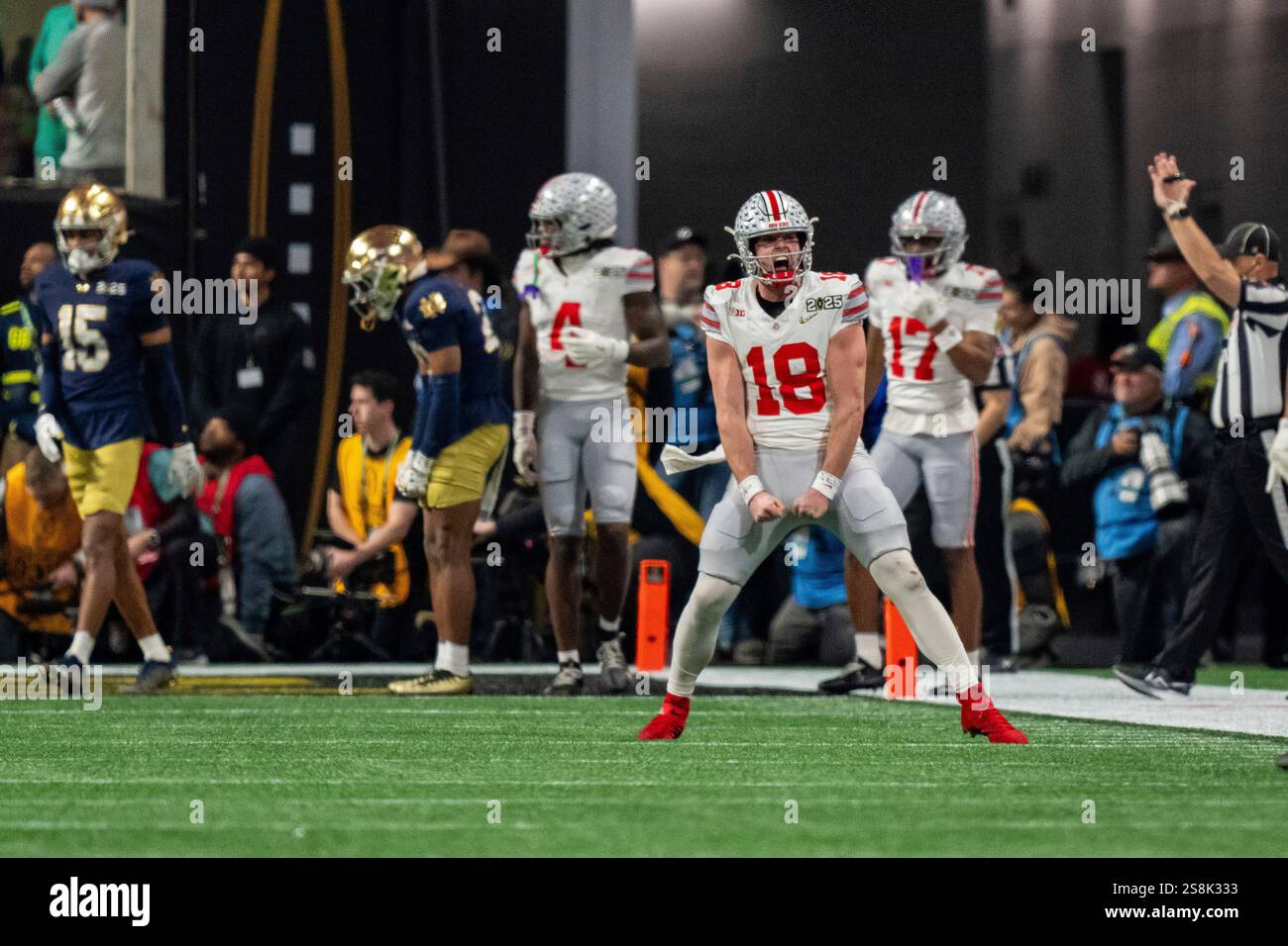 Ohio State quarterback Will Howard (18) celebrates his touchdown during