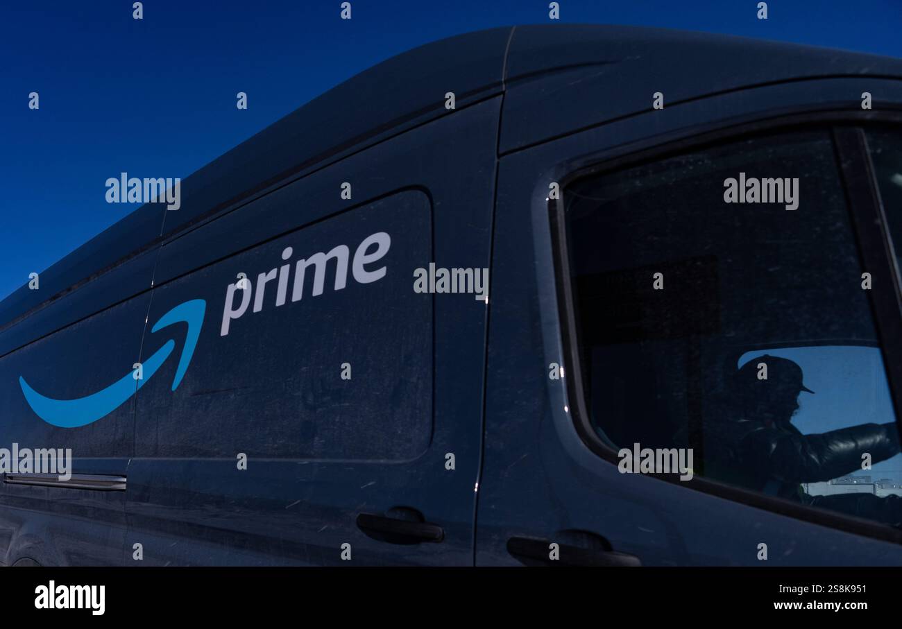 A delivery driver leaves Amazon's DXT4 warehouse in Laval, Que. on ...