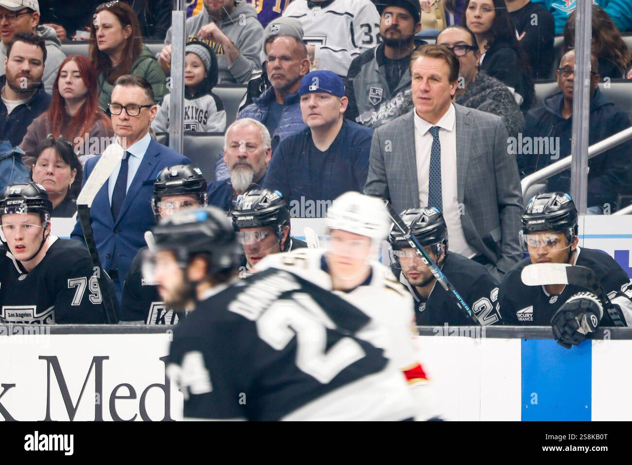 Los Angeles Kings head coach Jim Hiller, top right, reacts during the