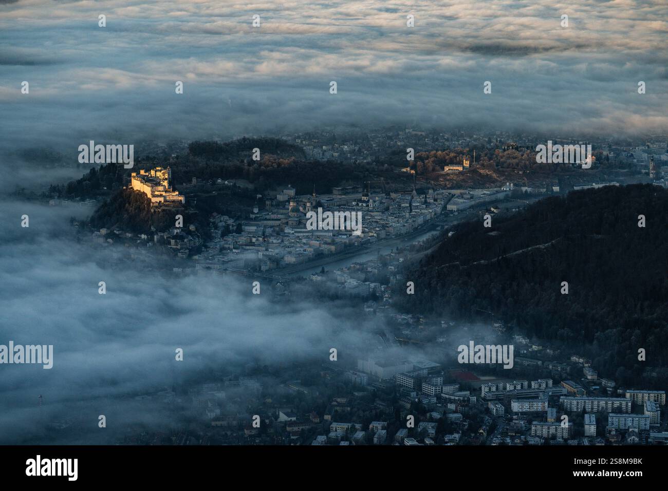 View of the city of Salzburg with the Hohenwerfen Fortress at sunrise