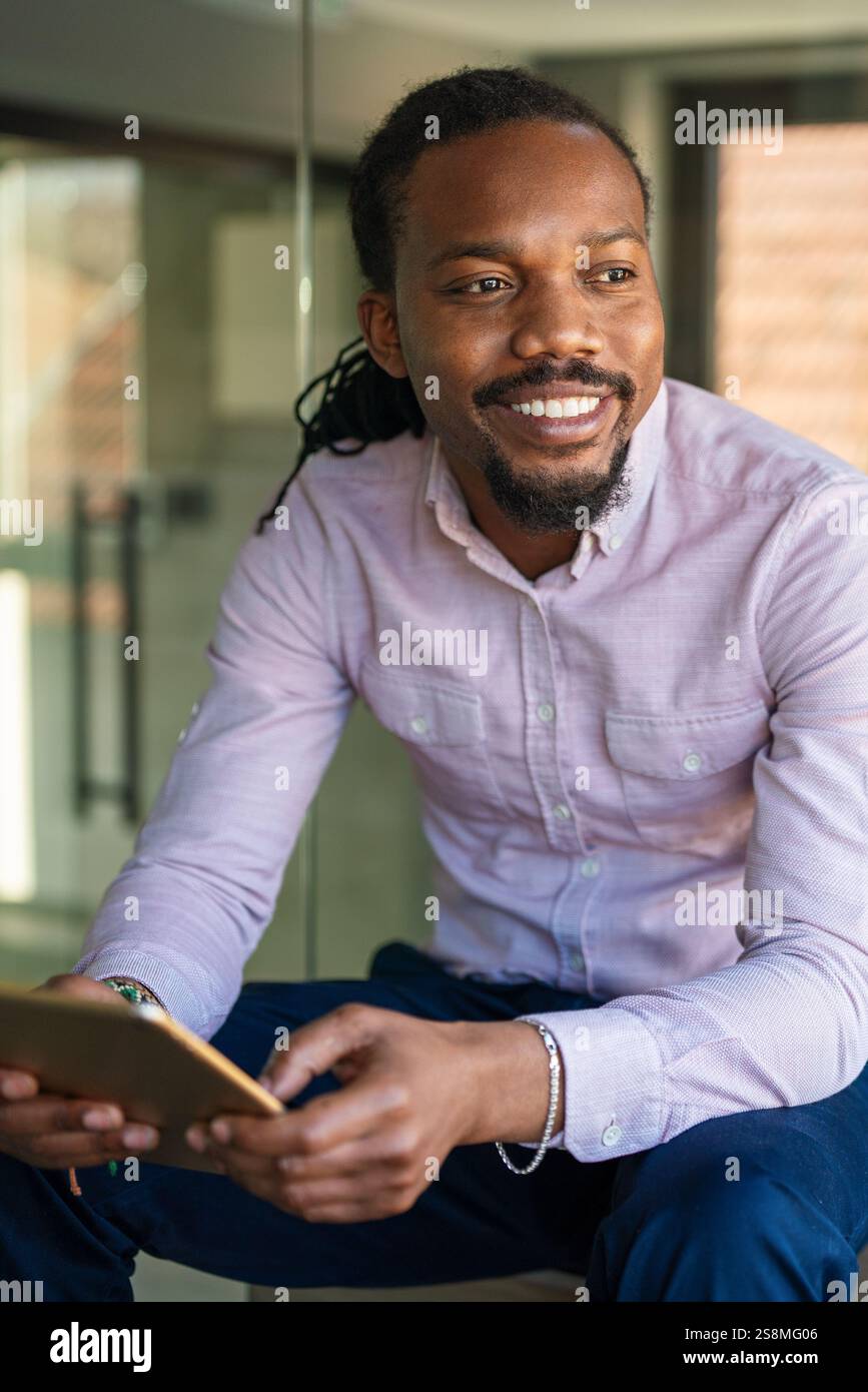 Happy software developer man working on project. Programming advanced code artificial intelligence Stock Photo