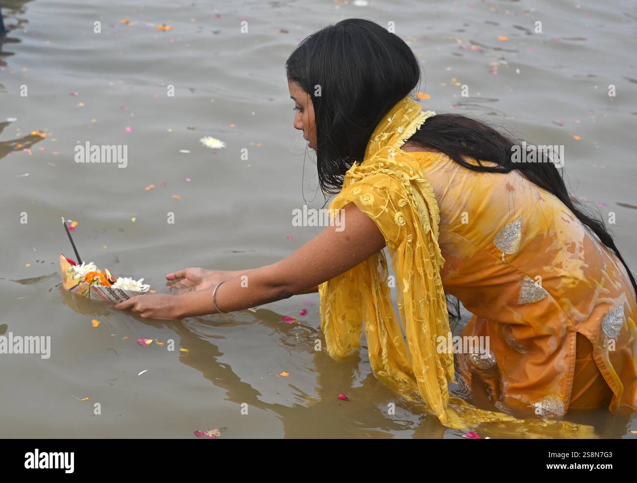 January 23, 2025: Prayagraj: Devotee perform ritual after take holydip ...
