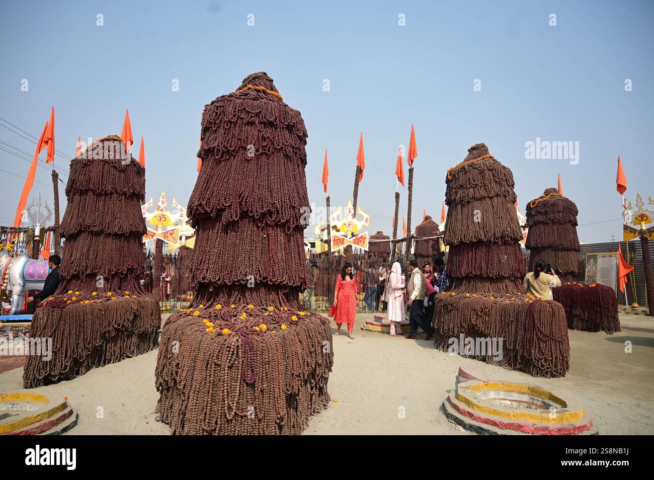 January 23, 2025: Prayagraj: Devotee perform rituals at a camp at ...