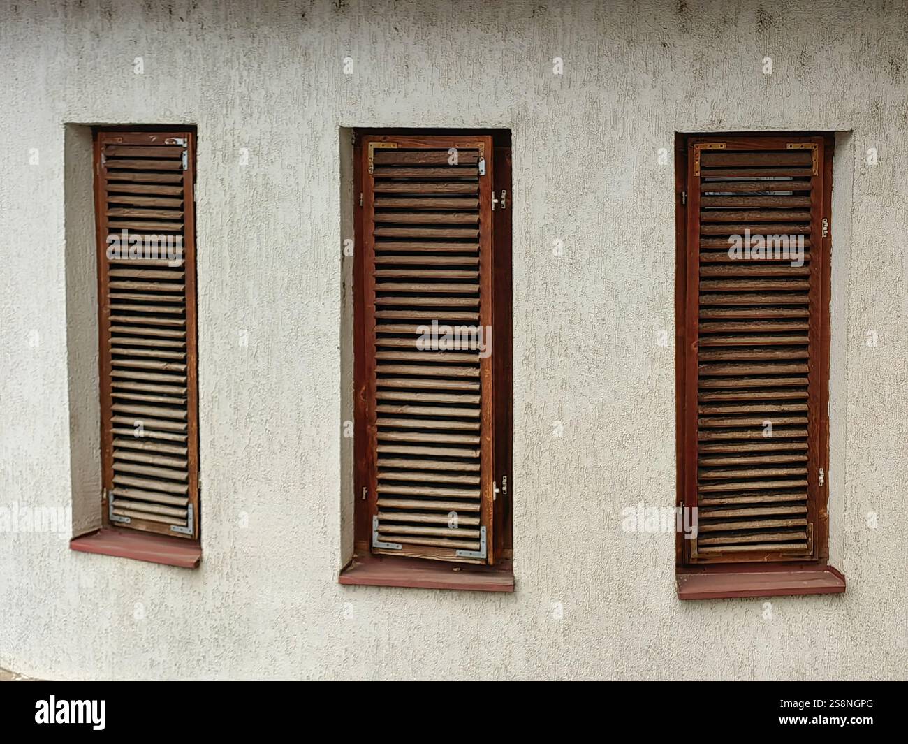 Urban Rhythm: Repetition of Wooden and Weathered Rectangle Window ...