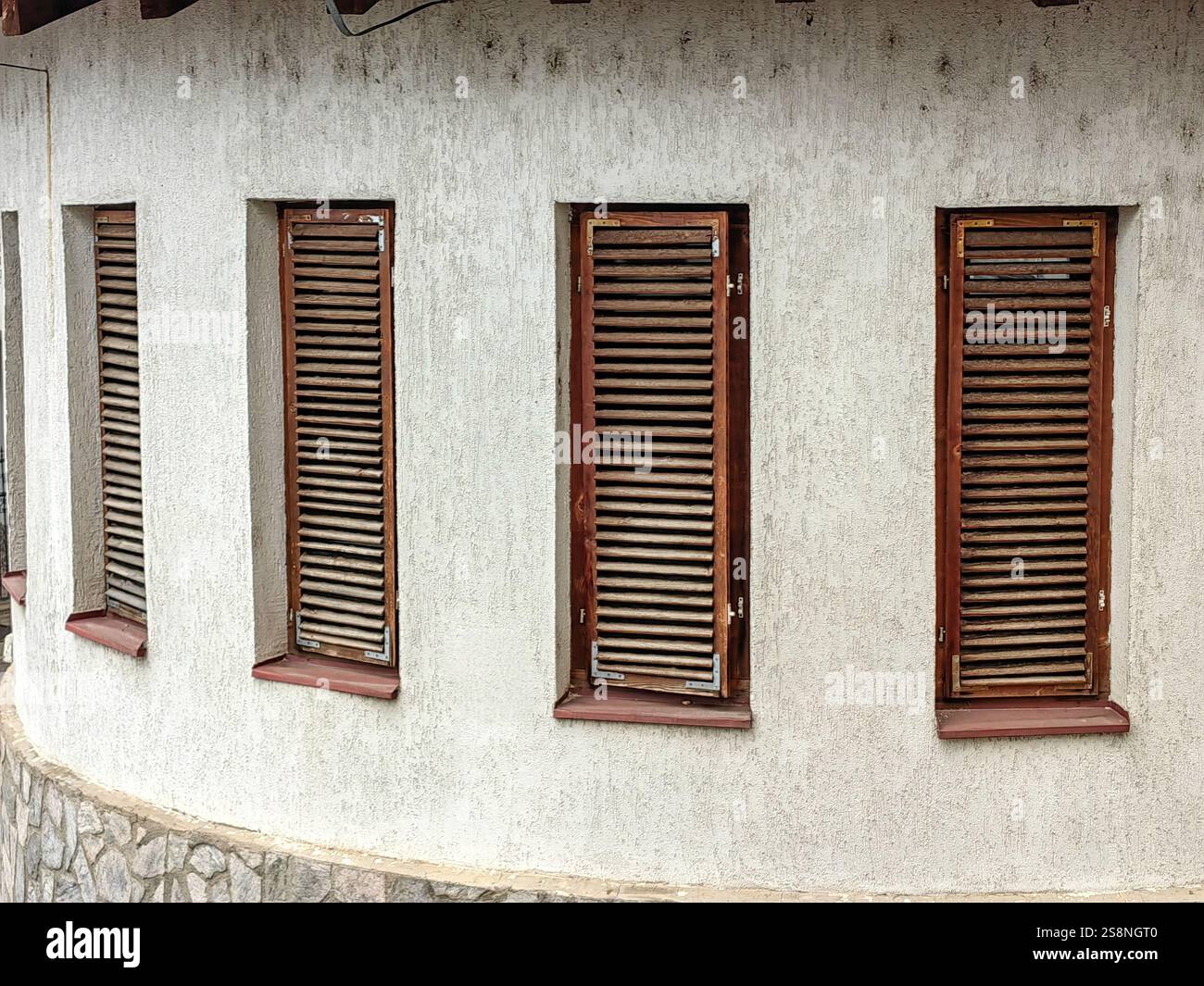 Urban Rhythm: Repetition of Wooden and Weathered Rectangle Window ...