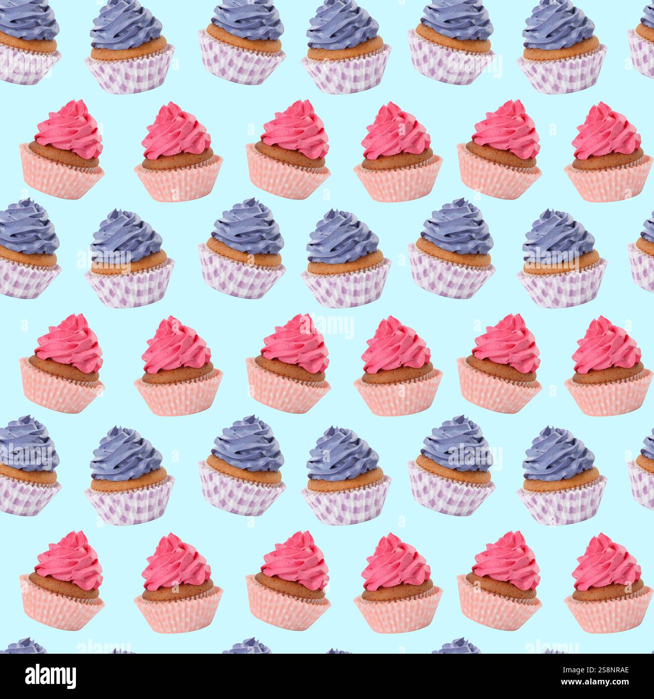 Pattern of cupcakes with cream on light blue background Stock Photo