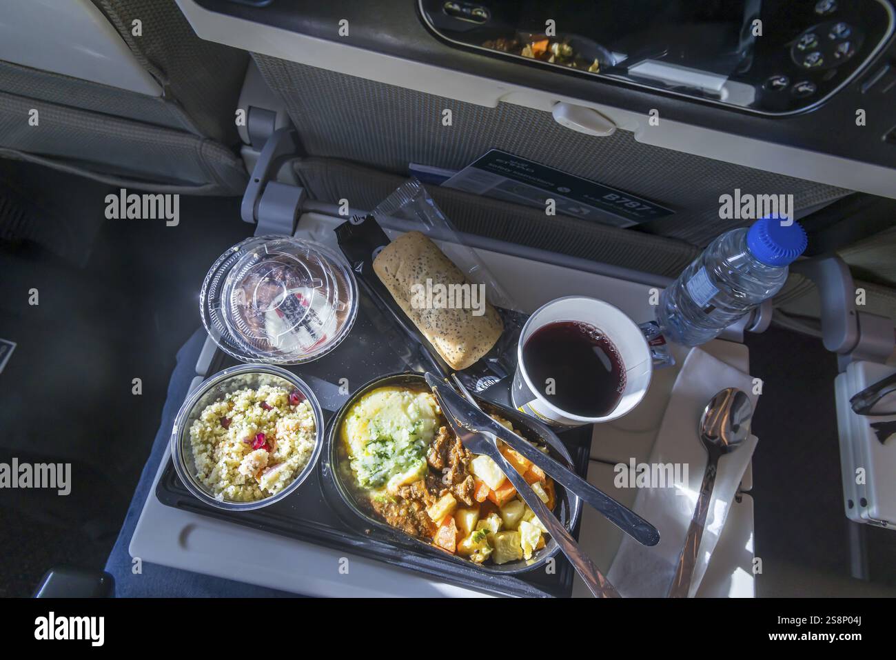 inside airline catering: from farm to plane - simple... Catering on board an Etihad airline aircraft, interior, cabin. Boeing ...