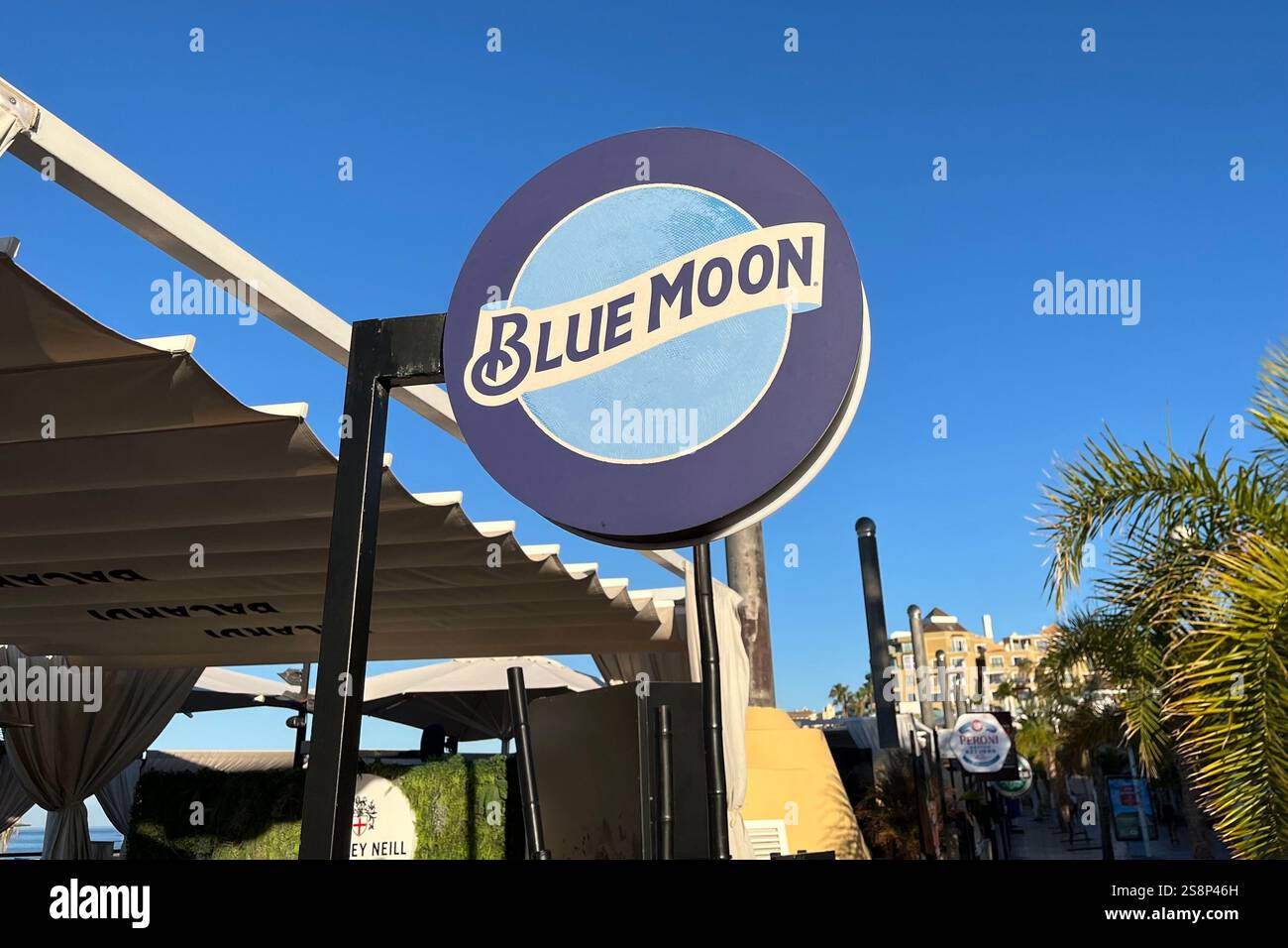 Blue Moon Sign on the Costa Adeje Seafront by Playa de Fanabe. Tenerife, Canary Islands, Spain. 12th January 2025. - Smartphone Captured Stock Image