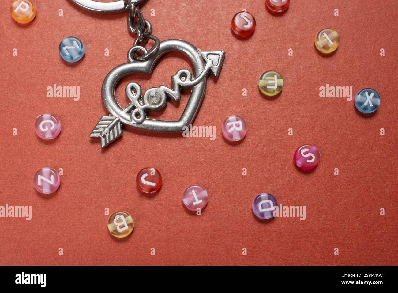 Heart shape and love wording amid colorful alphabet letters Stock Photo ...