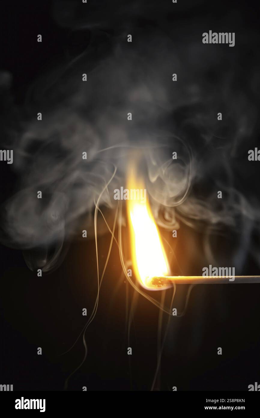 An image of a match flame dark background Stock Photo - Alamy