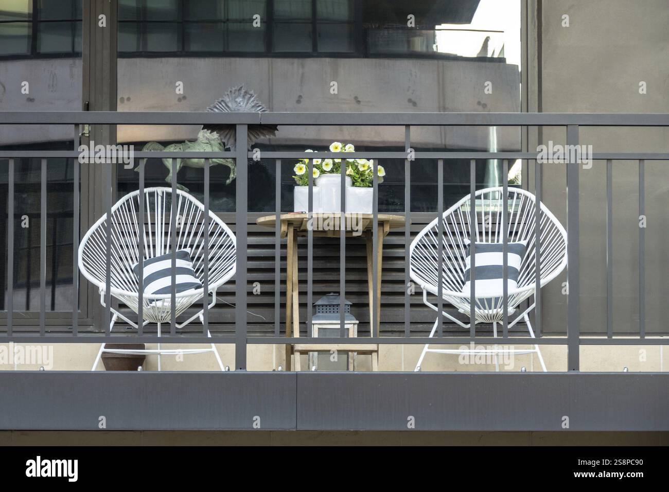 An image of two chairs at a balcony in New York City Stock Photo - Alamy