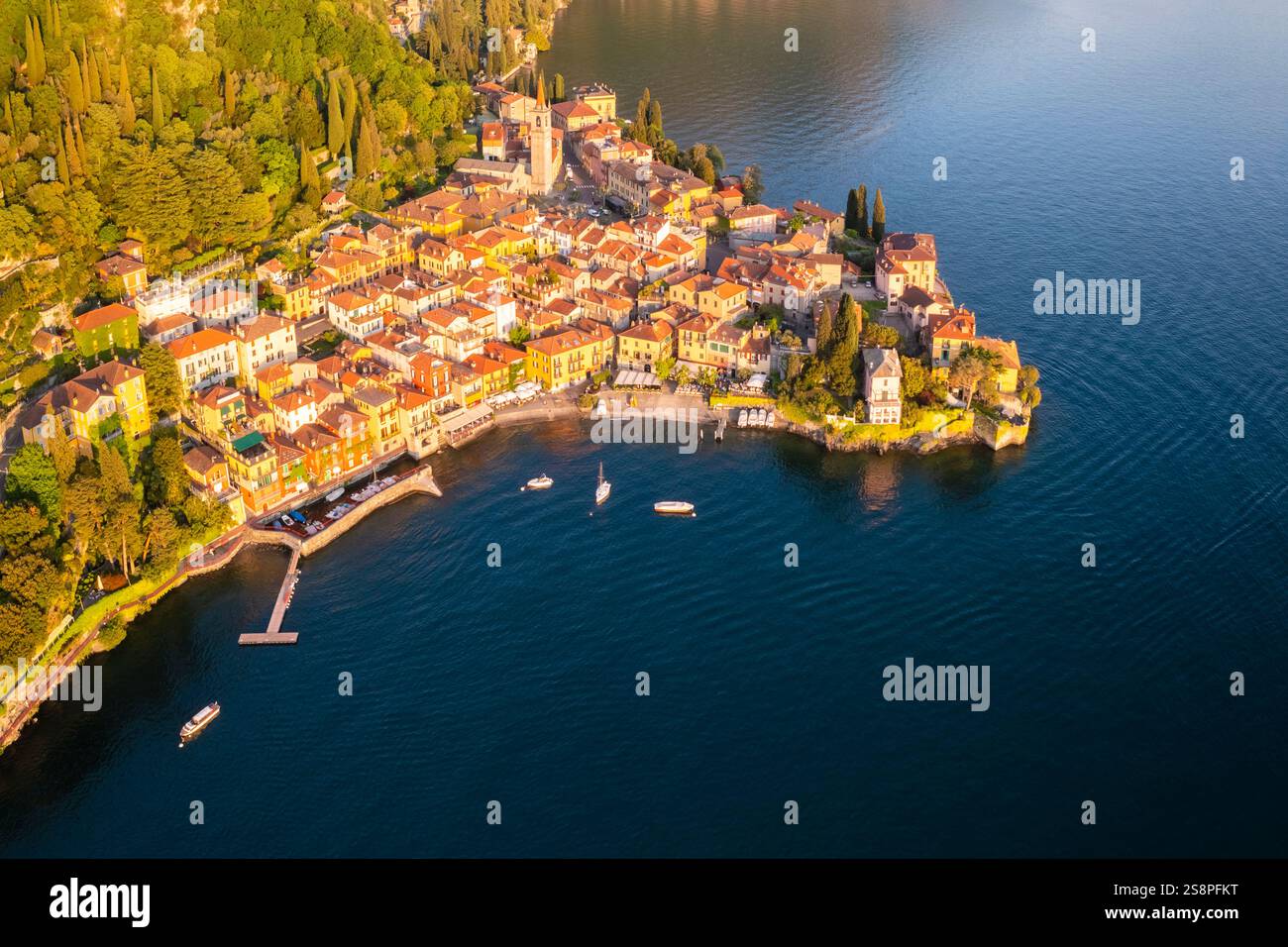 Aerial view of the town of Varenna, Lake Como, at sunset in summer. Varenna, Lecco district, Lombardy, Italy, Europe. Stock Photo