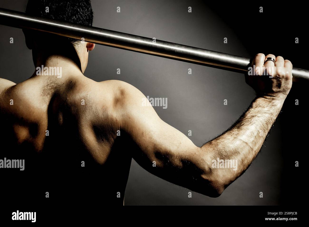 An image of a strong mans back Stock Photo - Alamy
