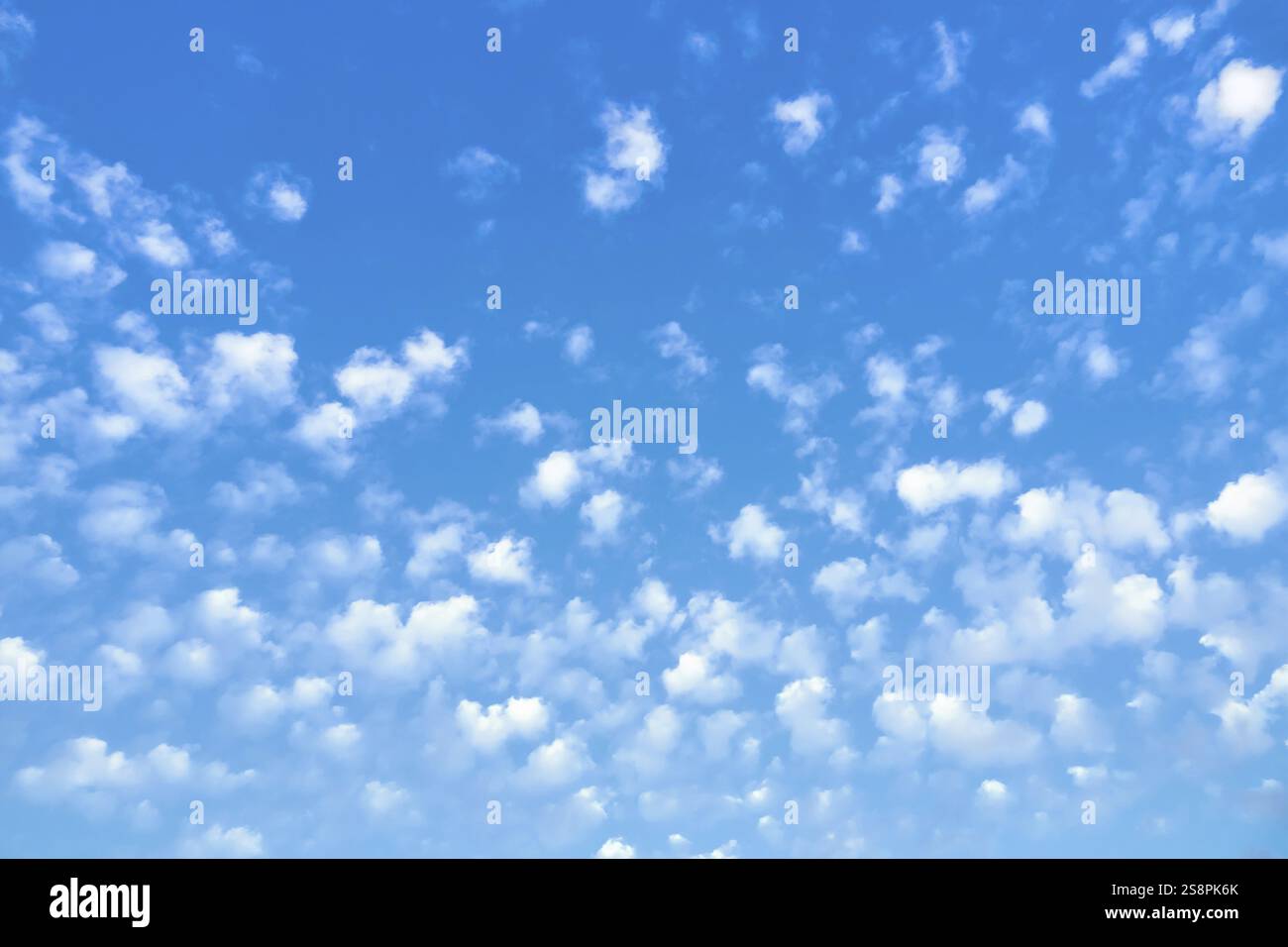 An image of a blue sky with lots of small clouds Stock Photo - Alamy