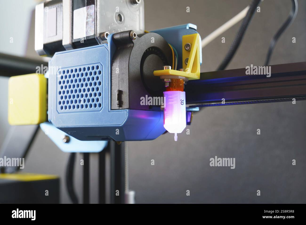 An image of a 3D printer head with leveling tool Stock Photo