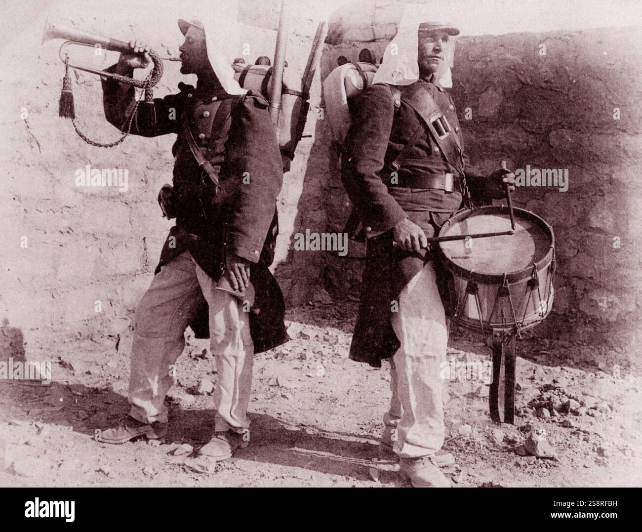 French Foreign Legion, soldiers with drum and trumpet at a caserne, or military barracks in a garrison town. Algeria, 1910 Stock Photo