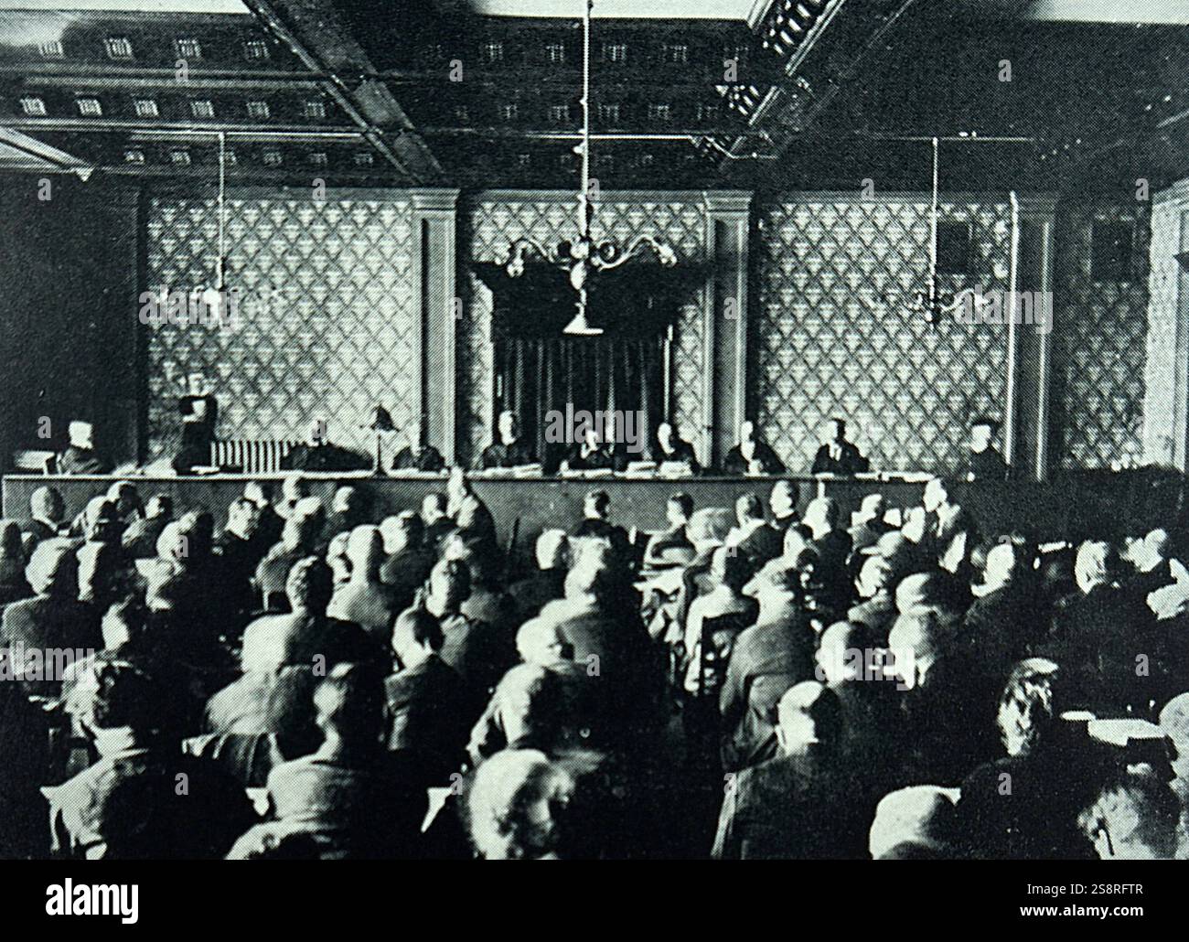 Secretly taken photograph of the trial of Adolf Hitler after the failed Munich Beer Hall Putsch. He was tried in the special People's Court in Munich began in February 1924. Hitler was sentenced to five years' imprisonment at Landsberg Prison. February 1924 Stock Photo