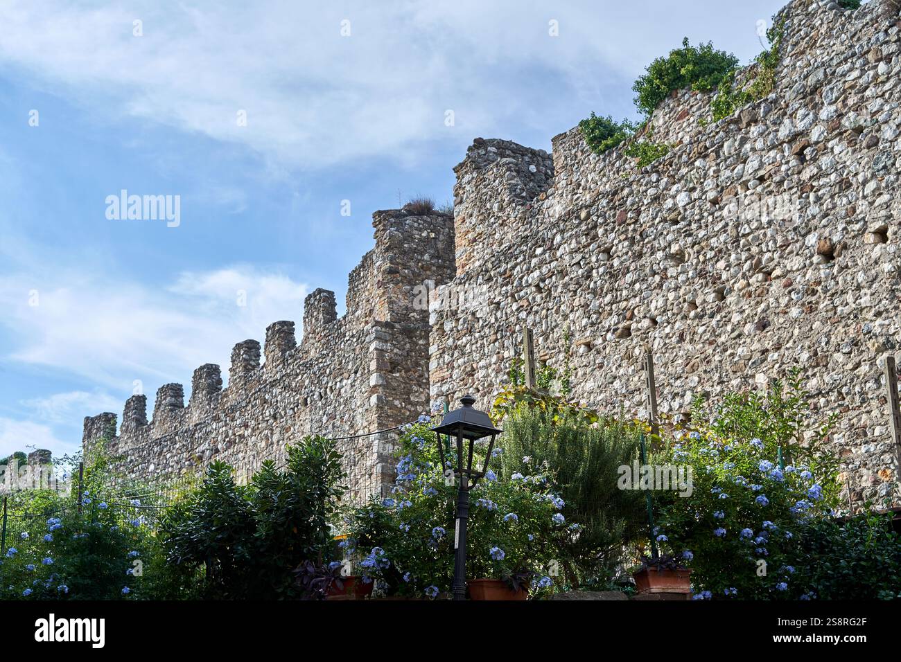 The stone ramparts of the medieval Padenghe Castle on Lake Garda, Italy ...