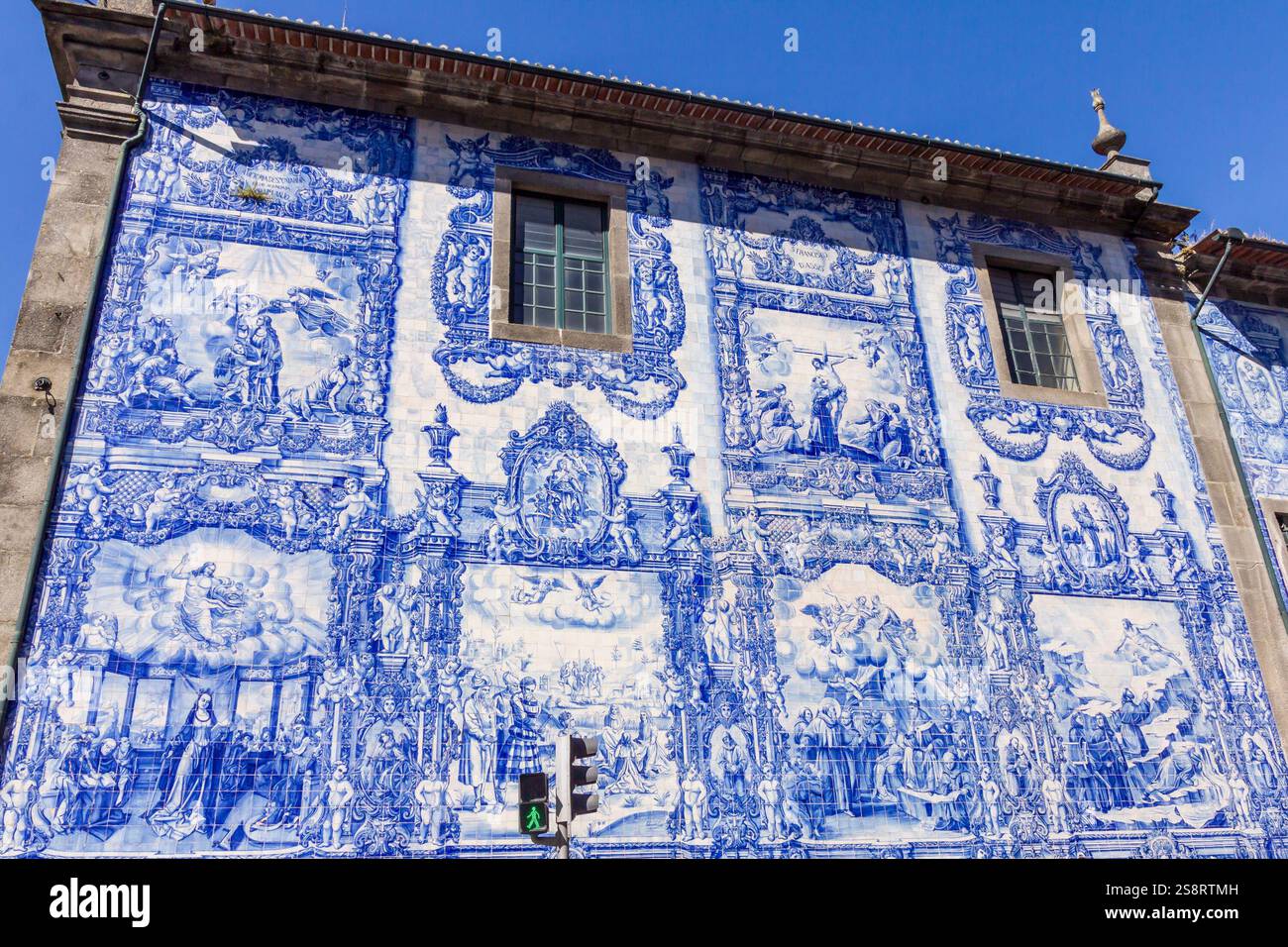 Porto, Portugal - 11 August, 2023: View of the facade of the Chapel of the Souls. It is one of the most photographed churches in Porto due to its magn Stock Photo